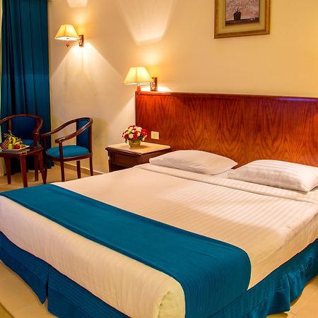Serenity Alpha Beach - Ex Serenity Makadi Beach Exteriér fotografie A bedroom in a hotel