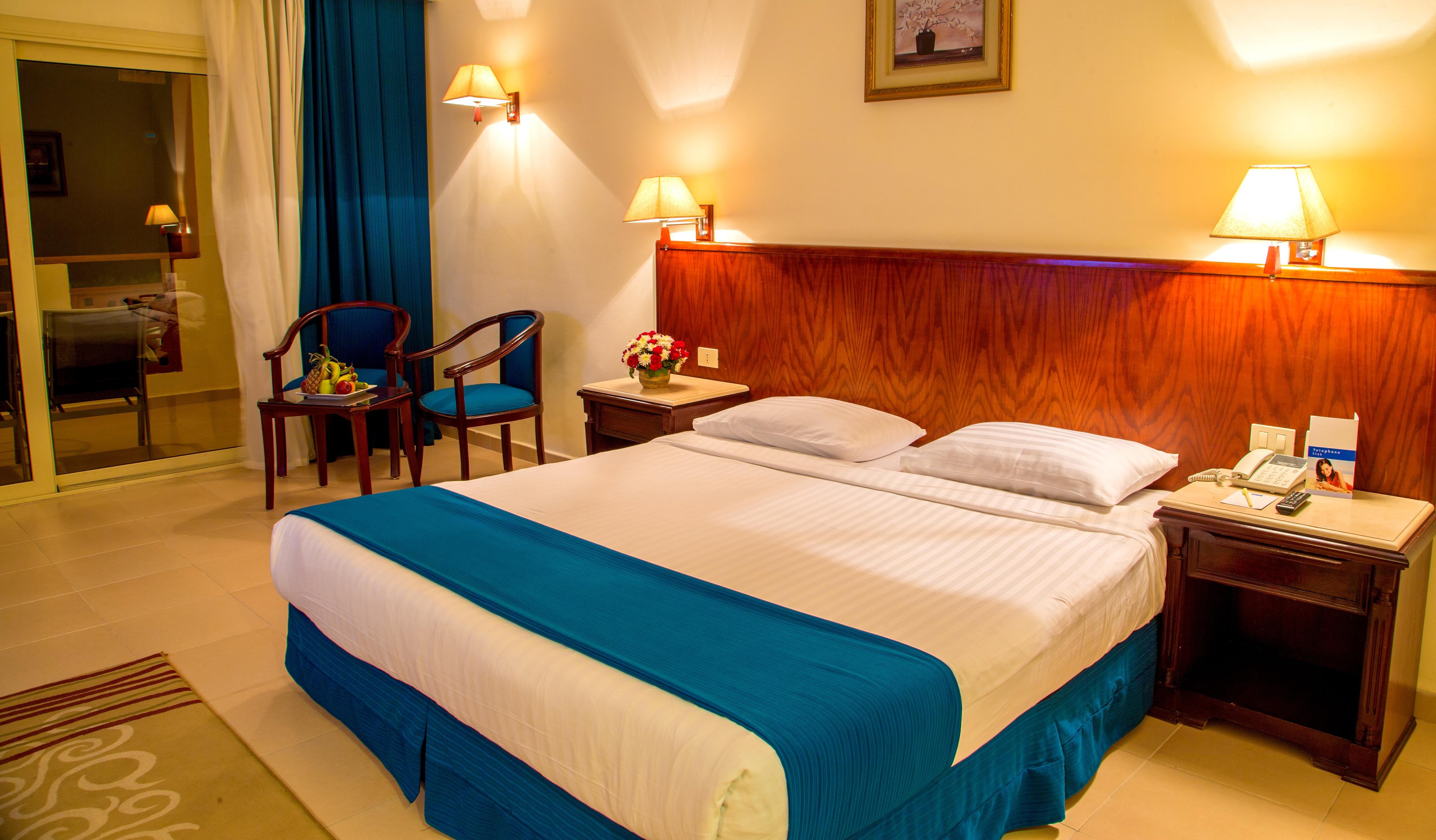 Serenity Alpha Beach - Ex Serenity Makadi Beach Exteriér fotografie A bedroom in a hotel